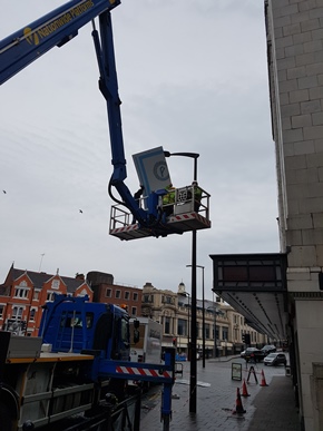 Lifting Part Sign into position