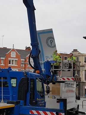 New Sign Section Being Lifted into place