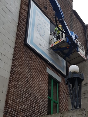 Removal of first panel old sign