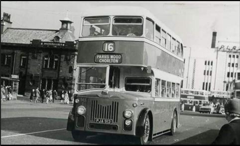 The No.16 heading from Stockport Bus Terminus to Parrs Wood & Chorlton with The Plaza watching on in the background